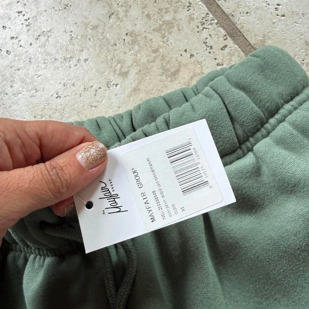 Brand new with tags XS sweatpants- empathy always Mayfair